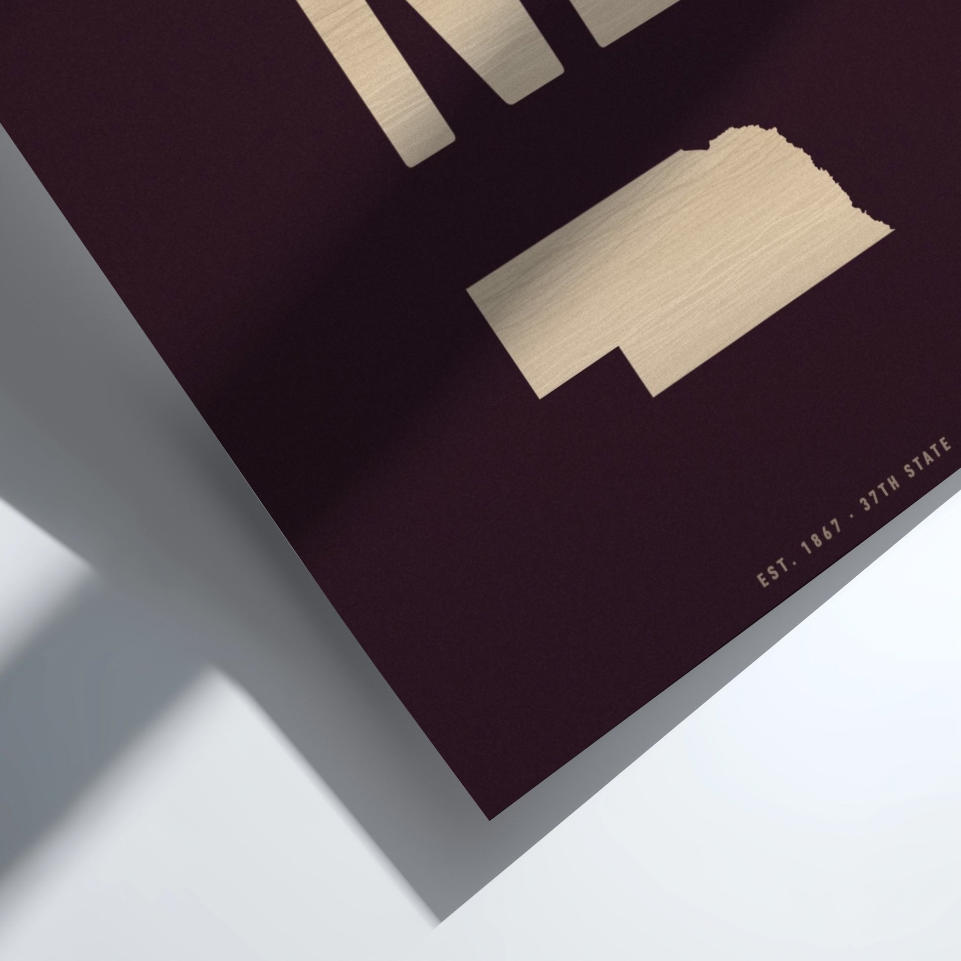 Gold geometric shapes on a dark purple background