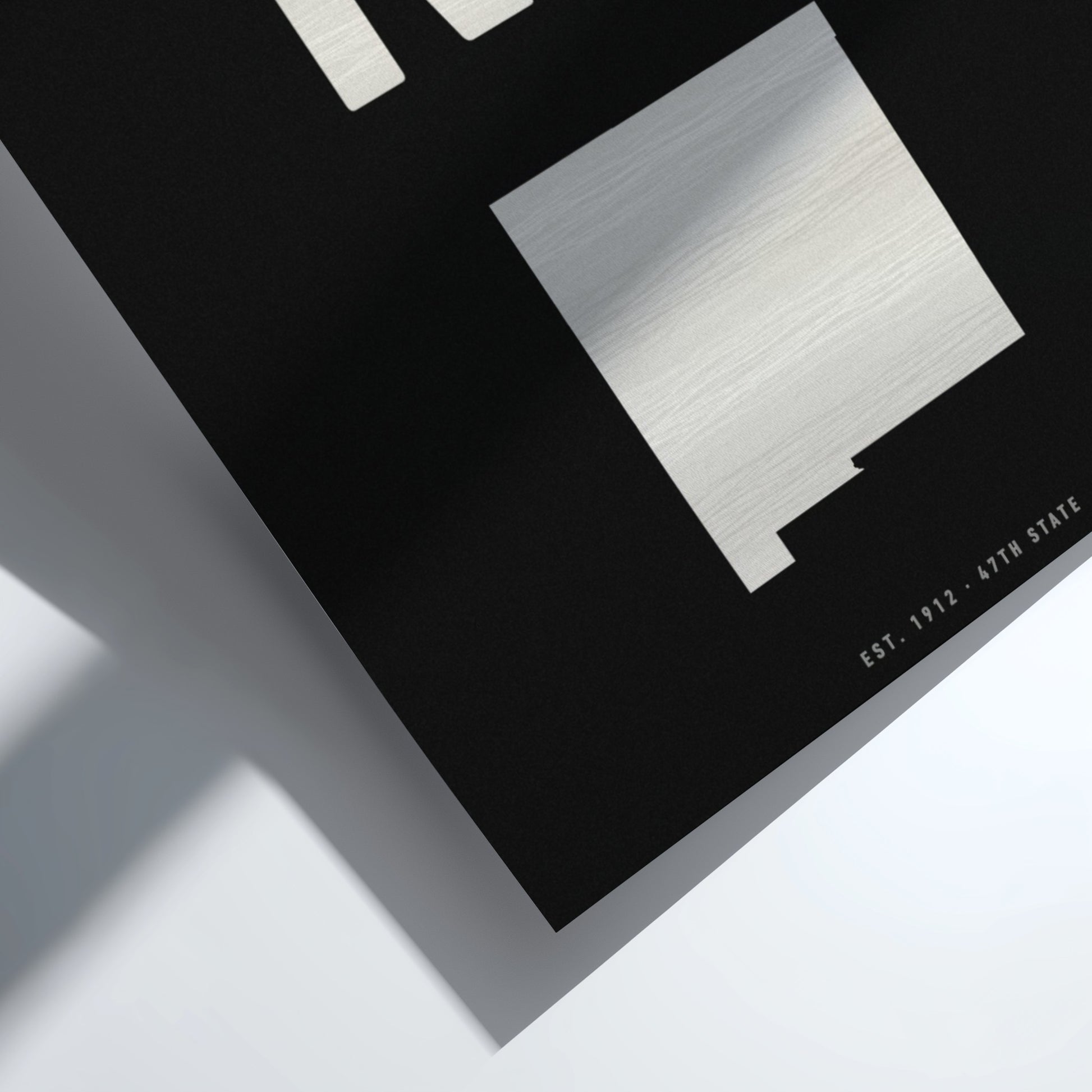 NM poster featuring bold typography and minimalist state outline