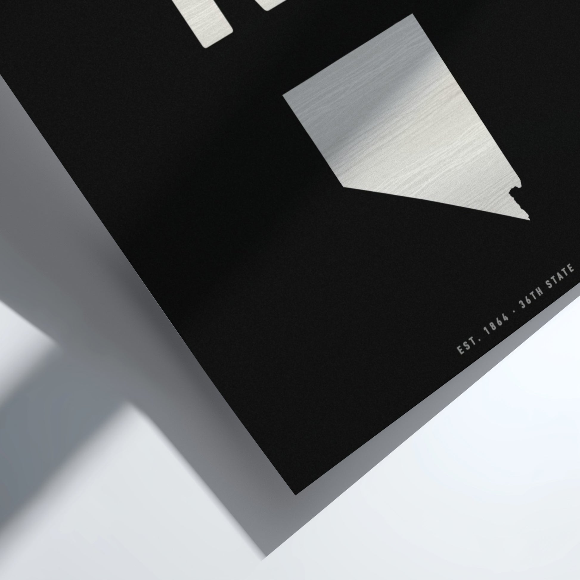 Nevada poster featuring gold typography and minimalist state outline