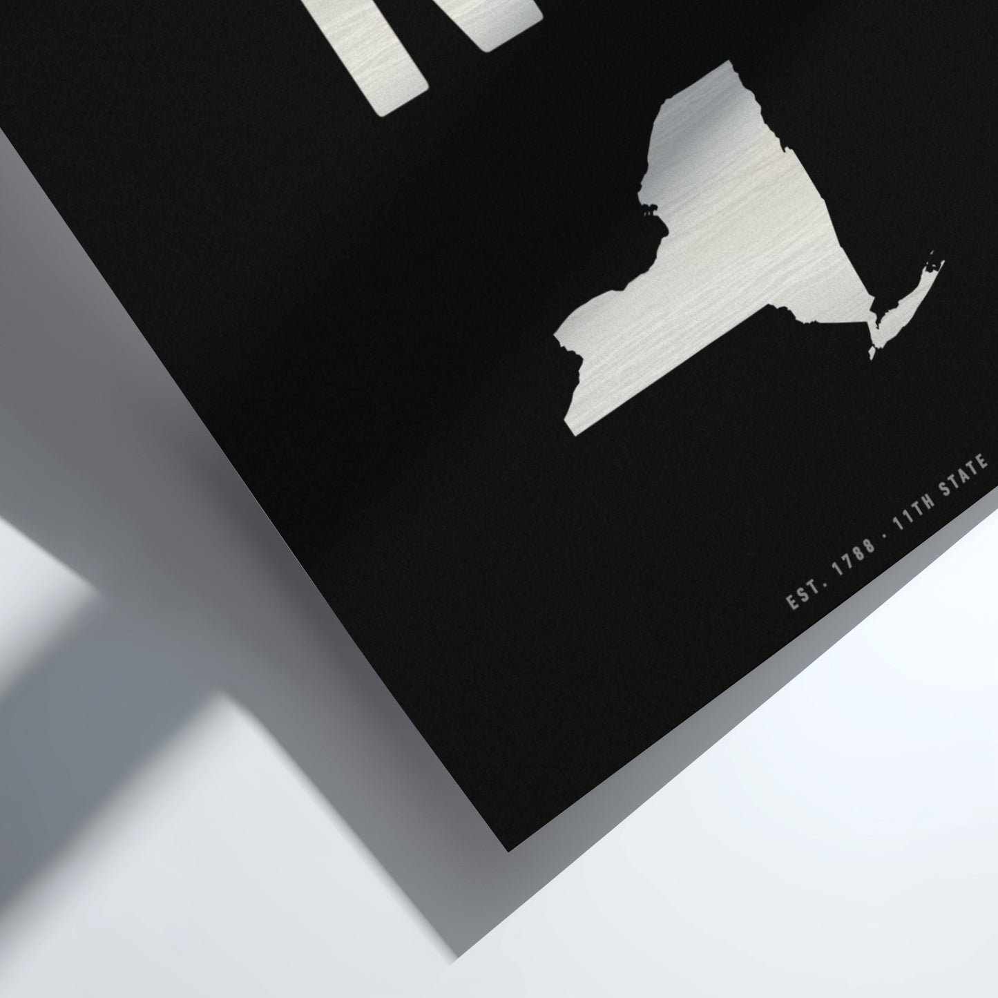 Map of NY on a black background with white outline
