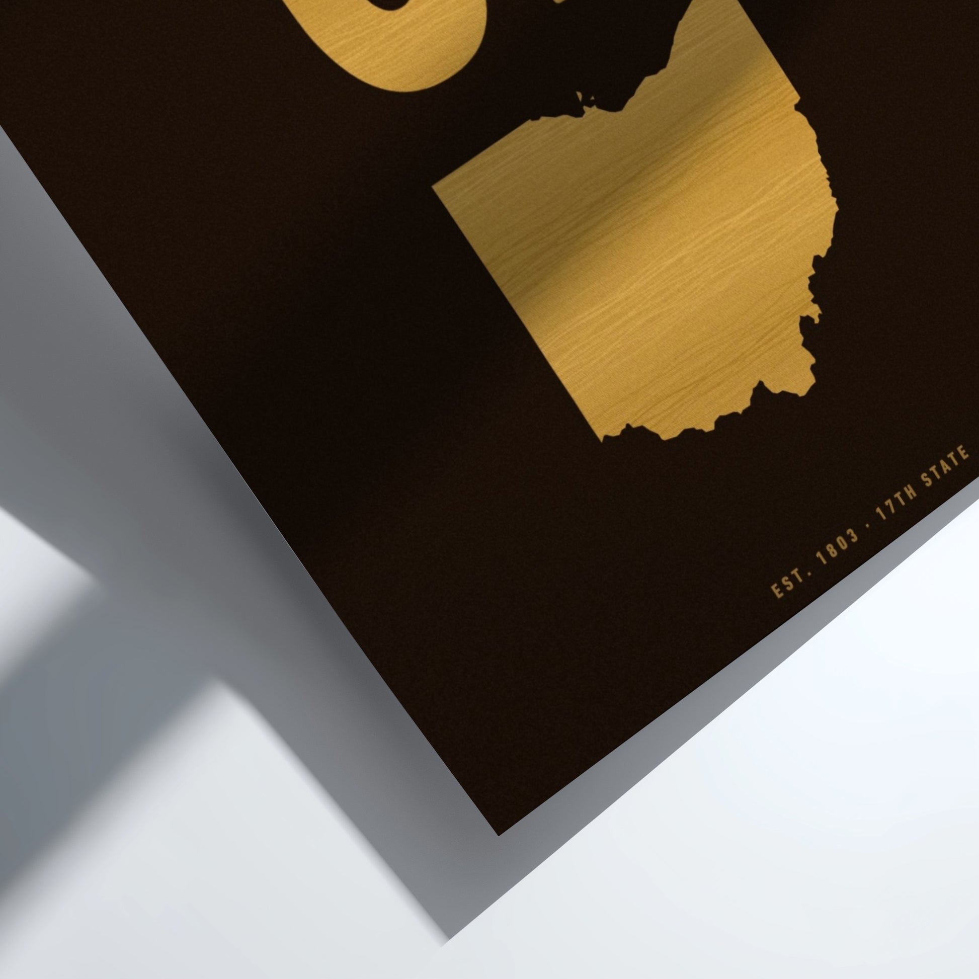 Gold state outline on a black background