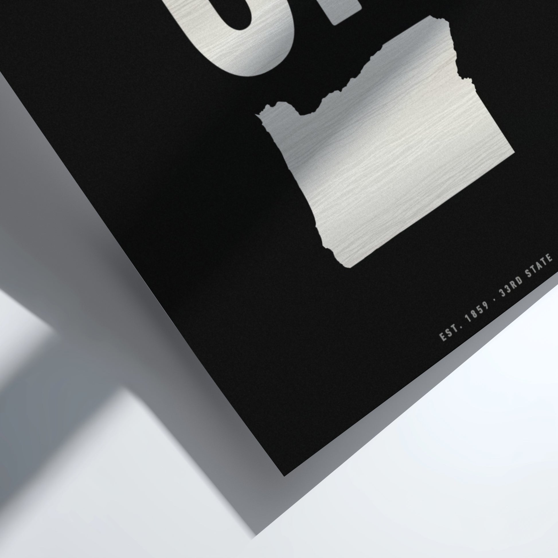 Black and white product packaging with a textured surface