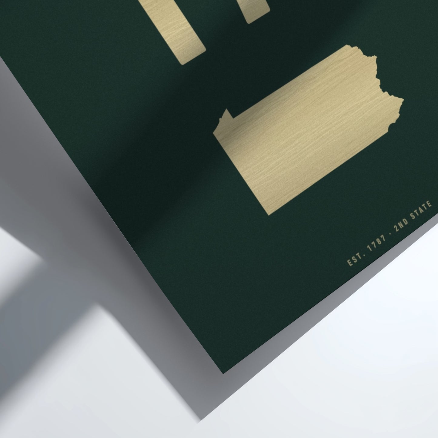 Gold state outline on a green background