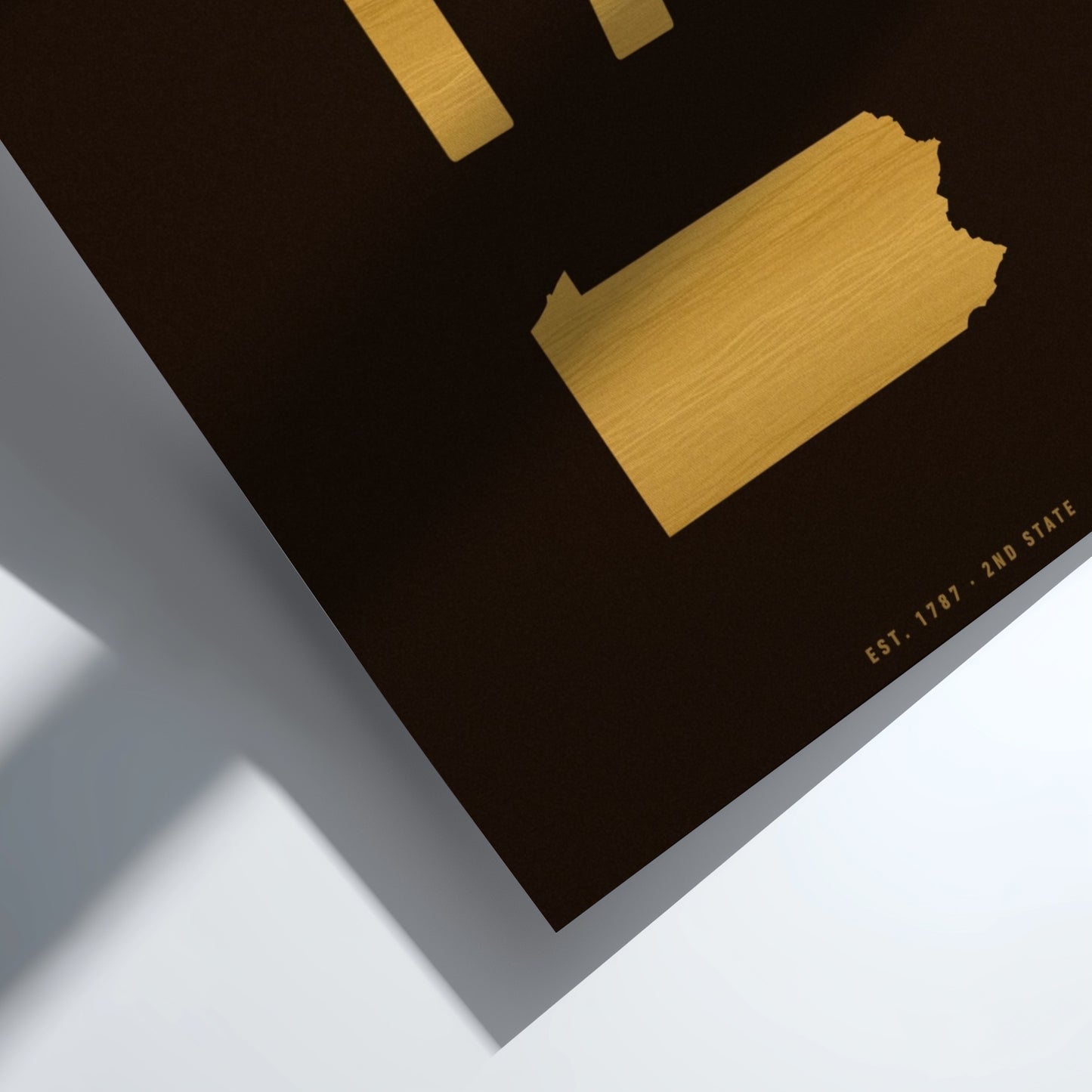Gold state outline on a black background