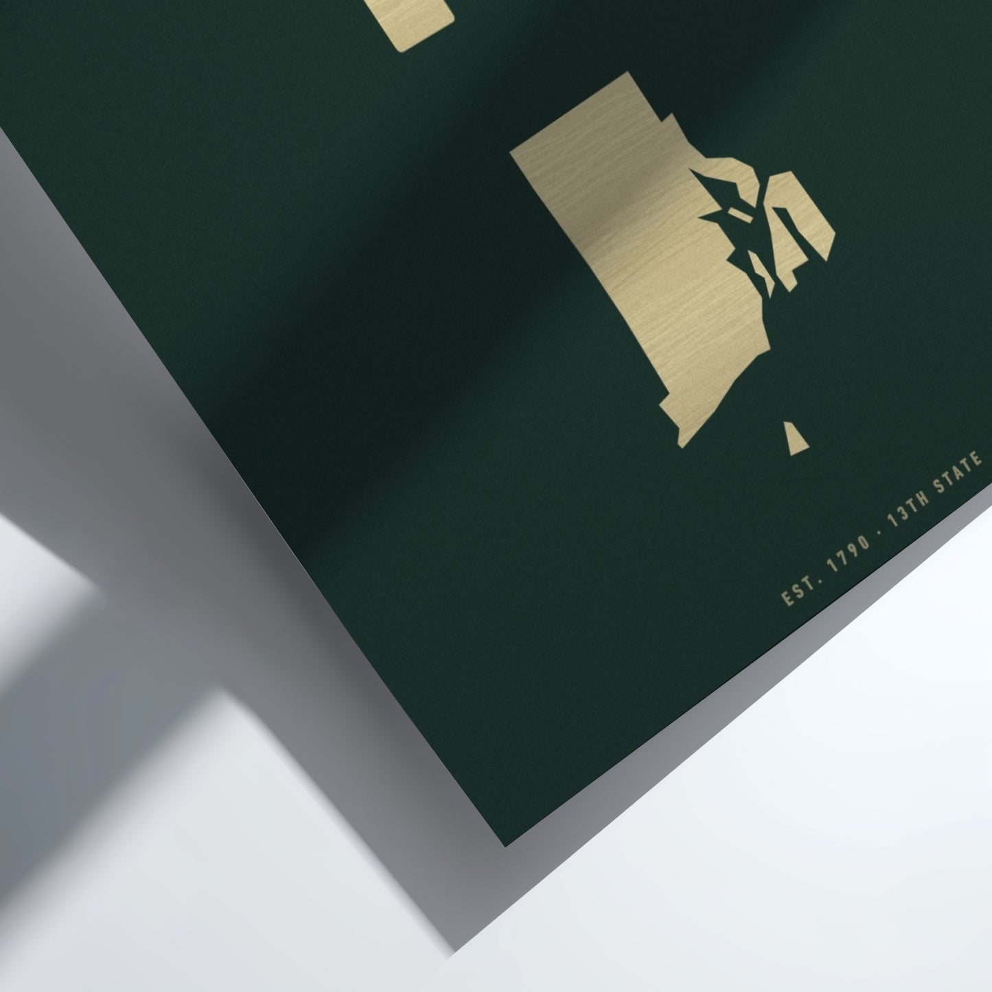 Green and gold decorative paper with a cut-out design on a white background
