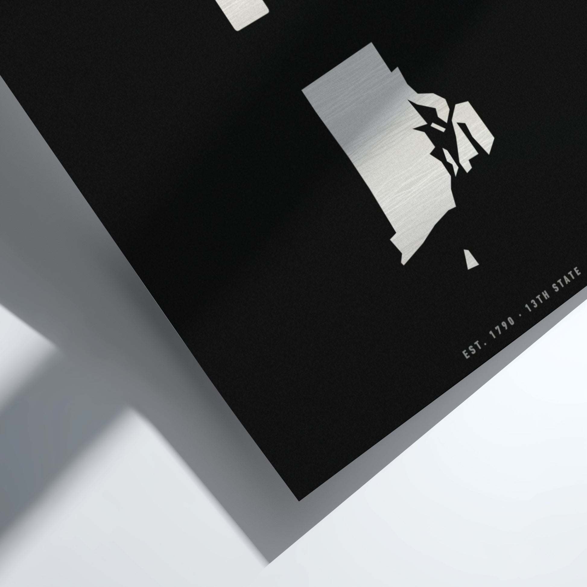 Black and white abstract art piece on a white background