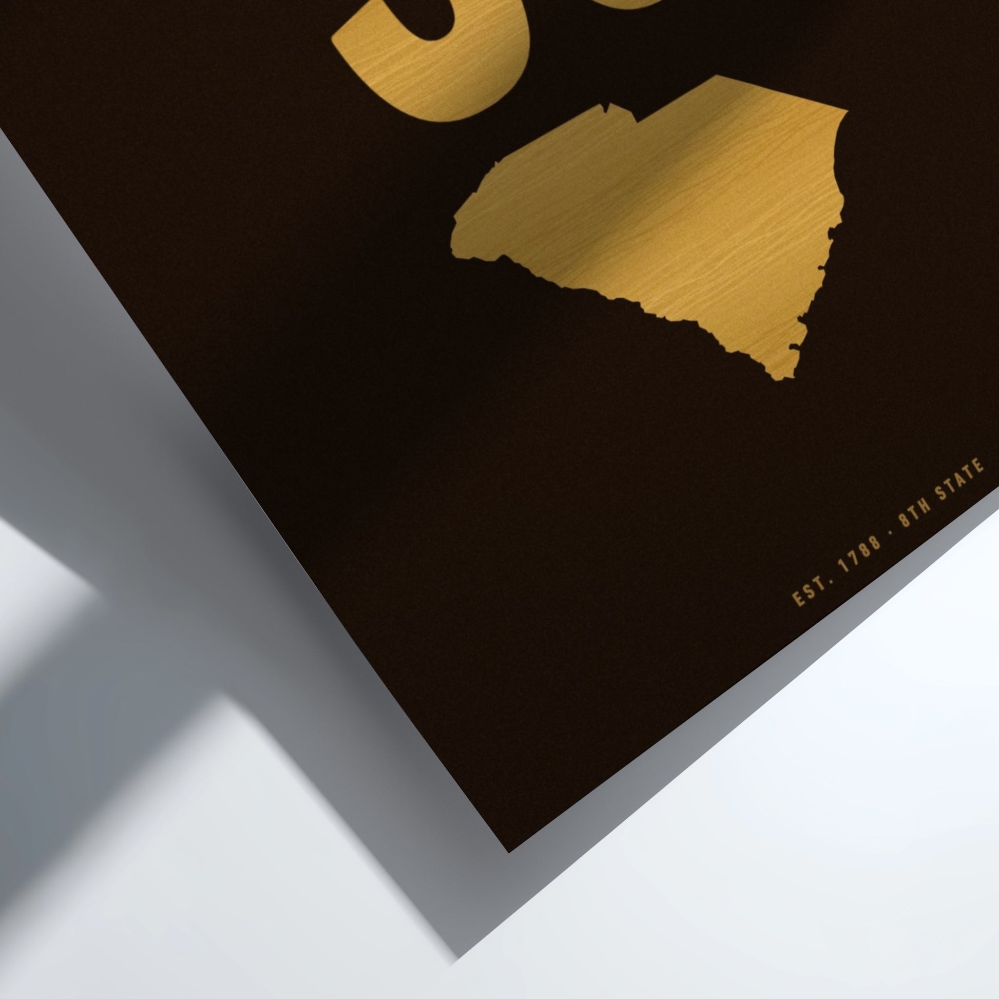 Gold state outline on a black background