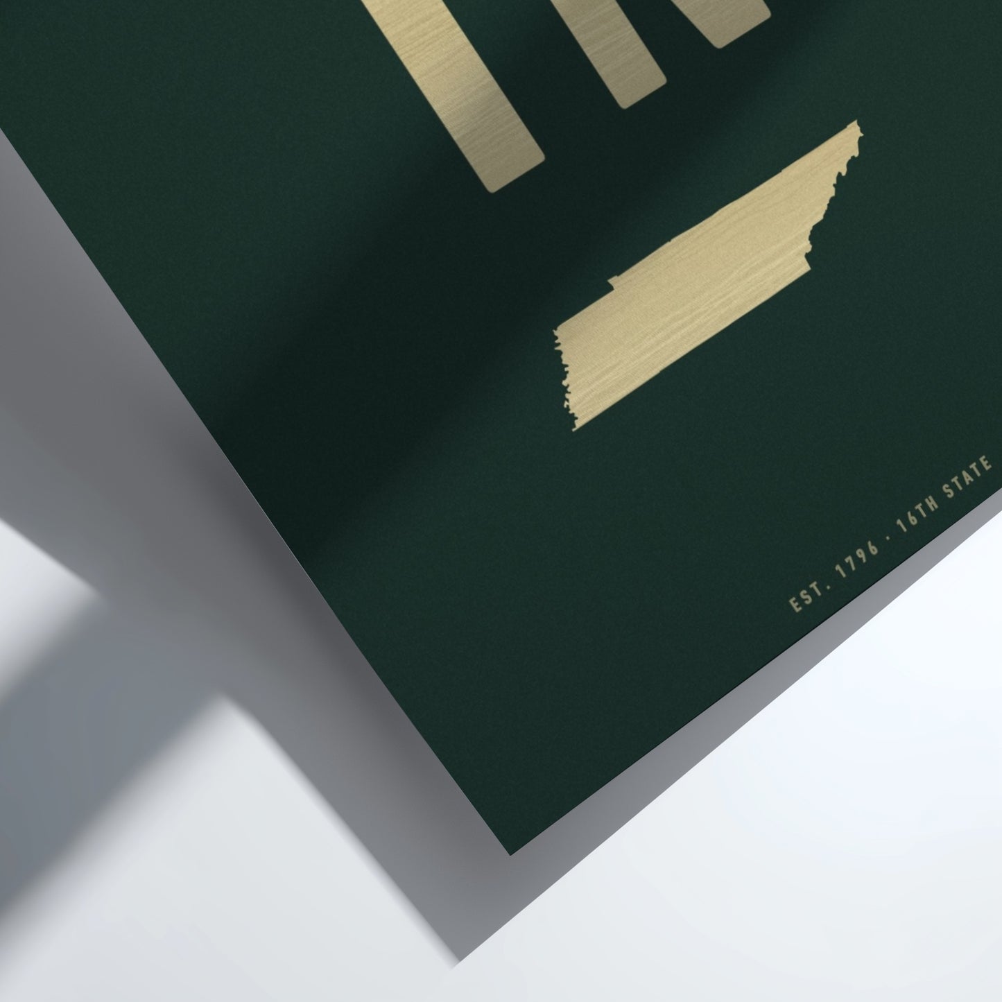 Map of Tennessee on a green background with gold accents