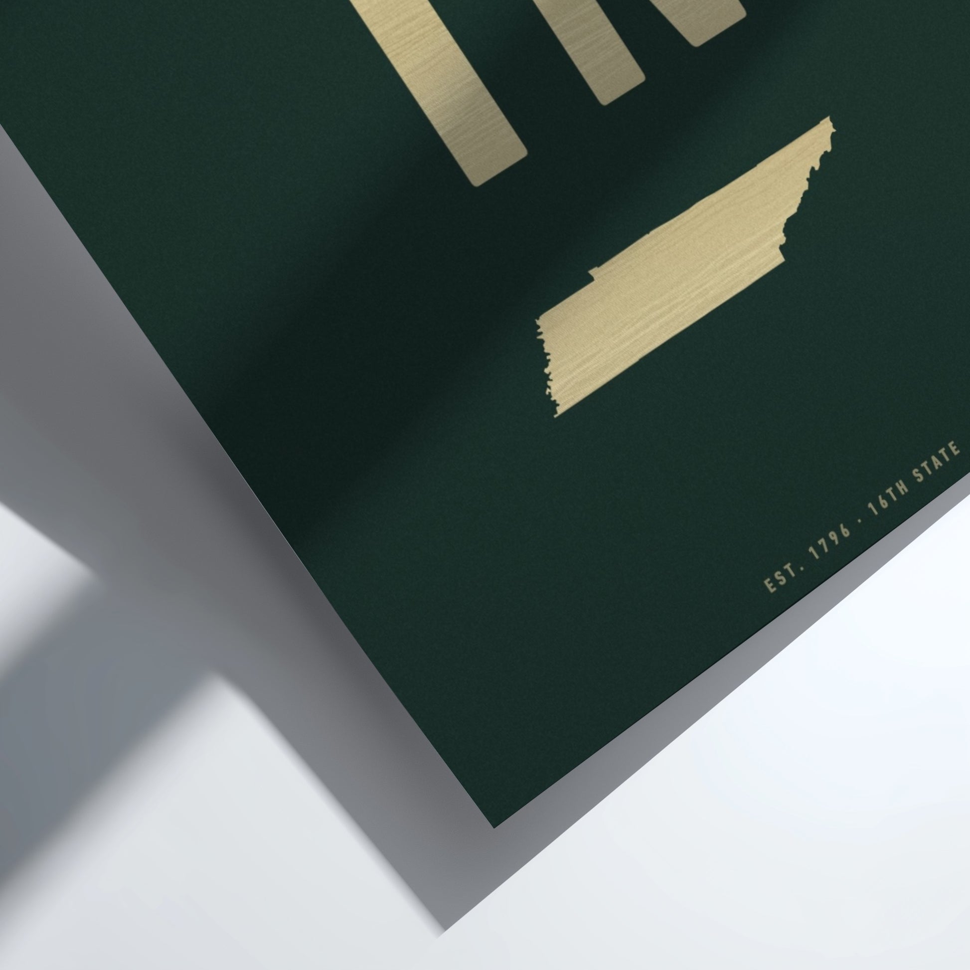 Map of Tennessee on a green background with gold accents