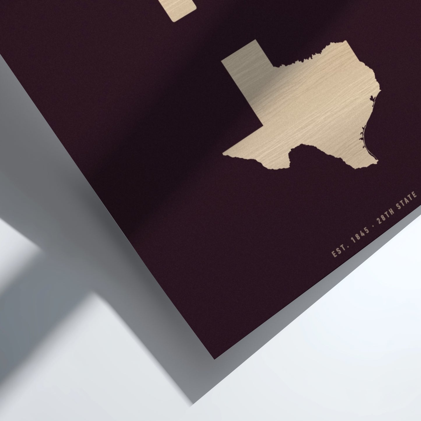 Gold Texas state outline on a dark purple background