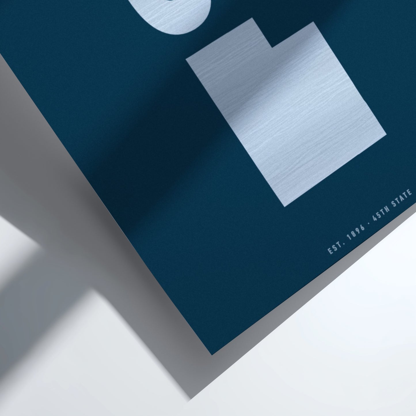 Blue notebook with a white cover on a white background