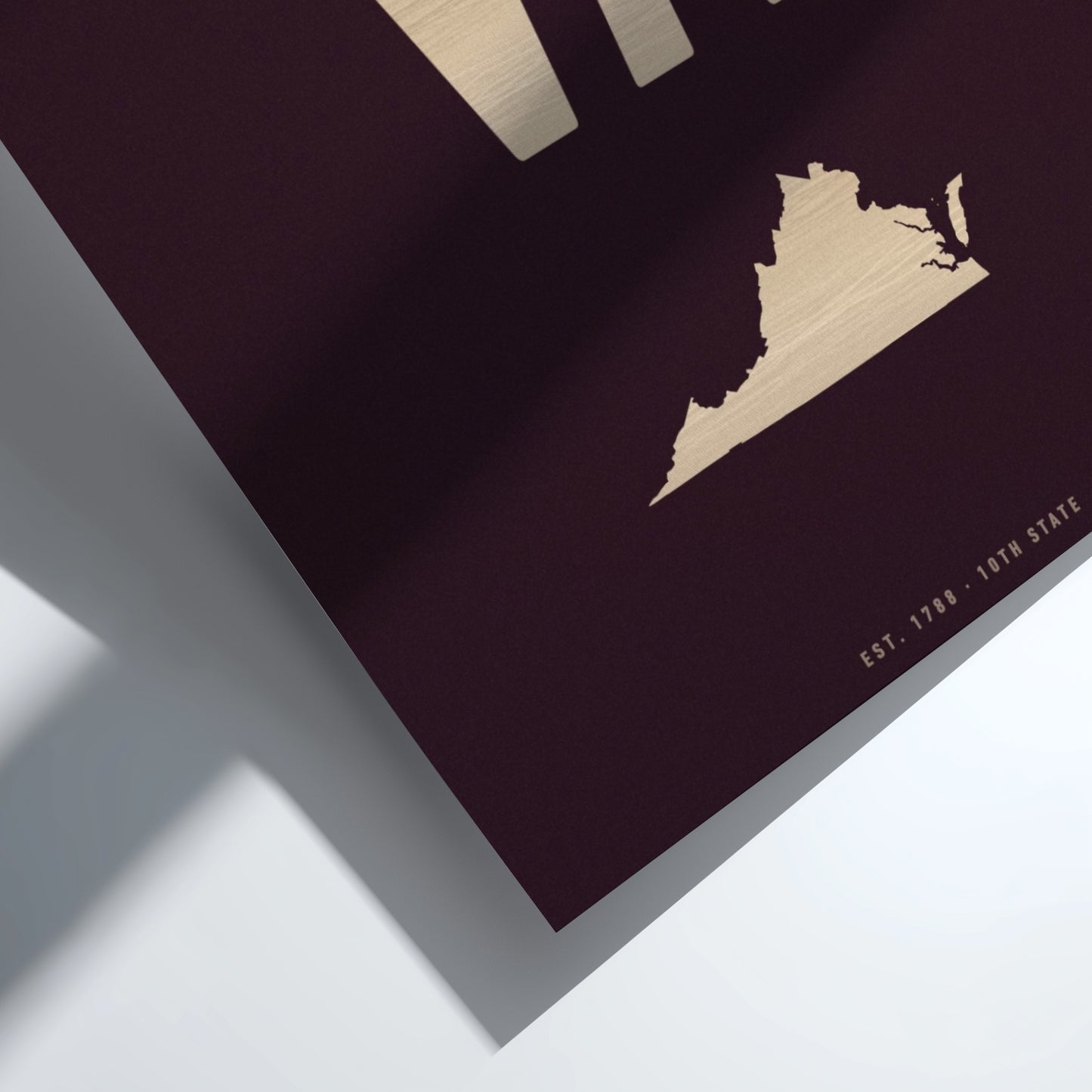 Map of Virginia on a dark surface with a light wood finish