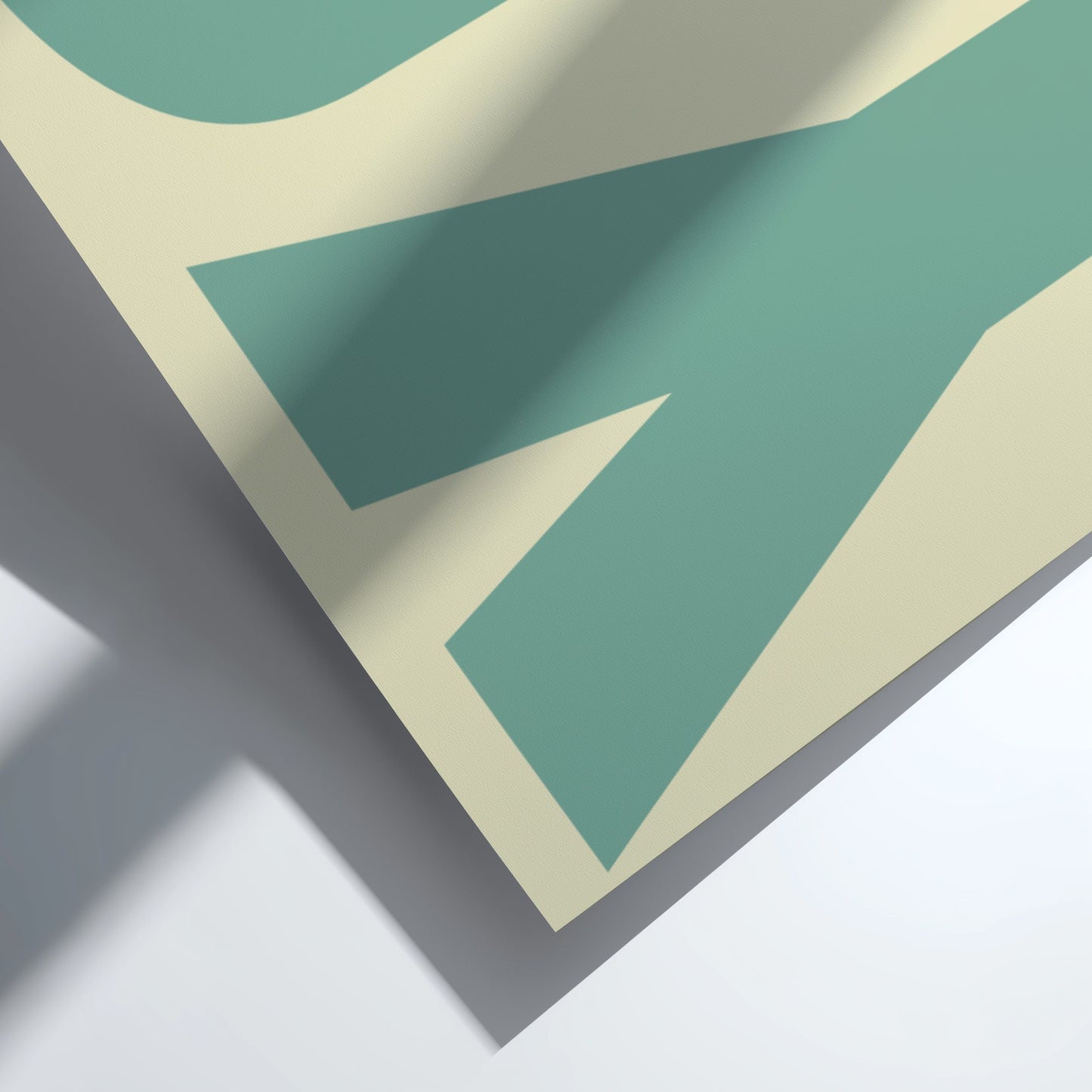 Geometric pattern with green and beige shapes on a white background