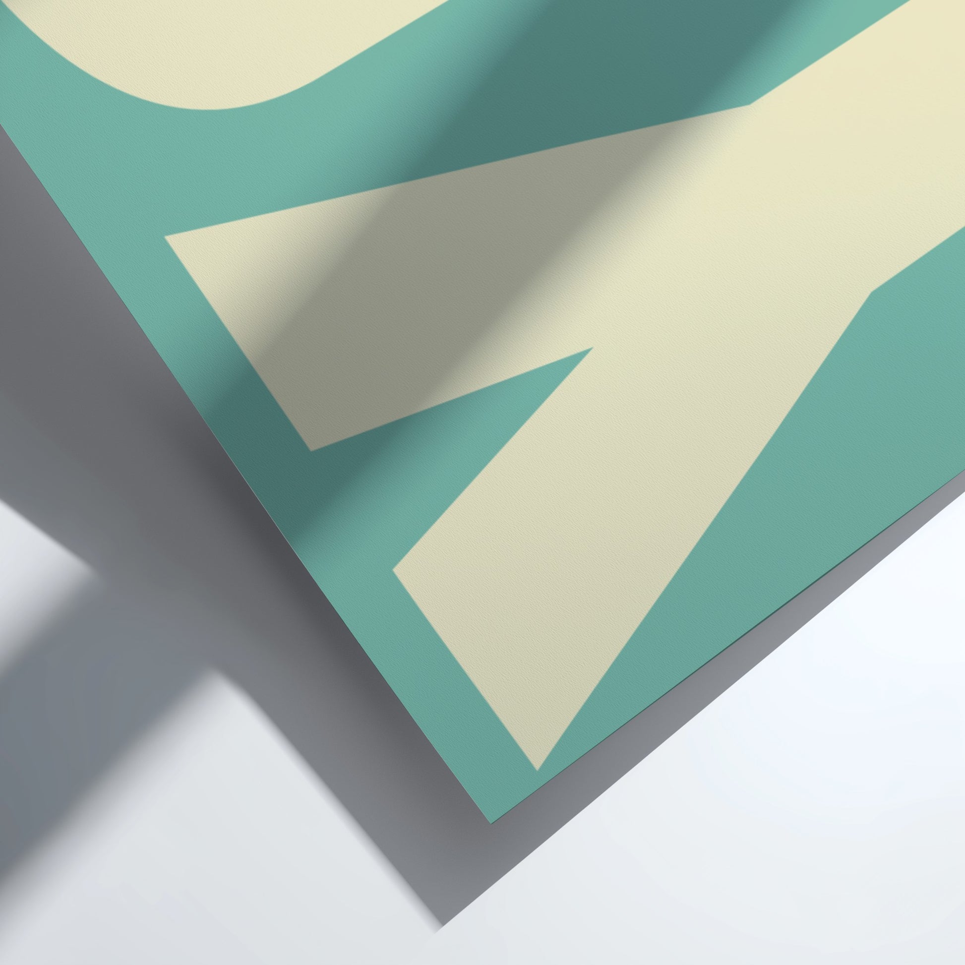 Geometric pattern with teal and beige shapes on a white background