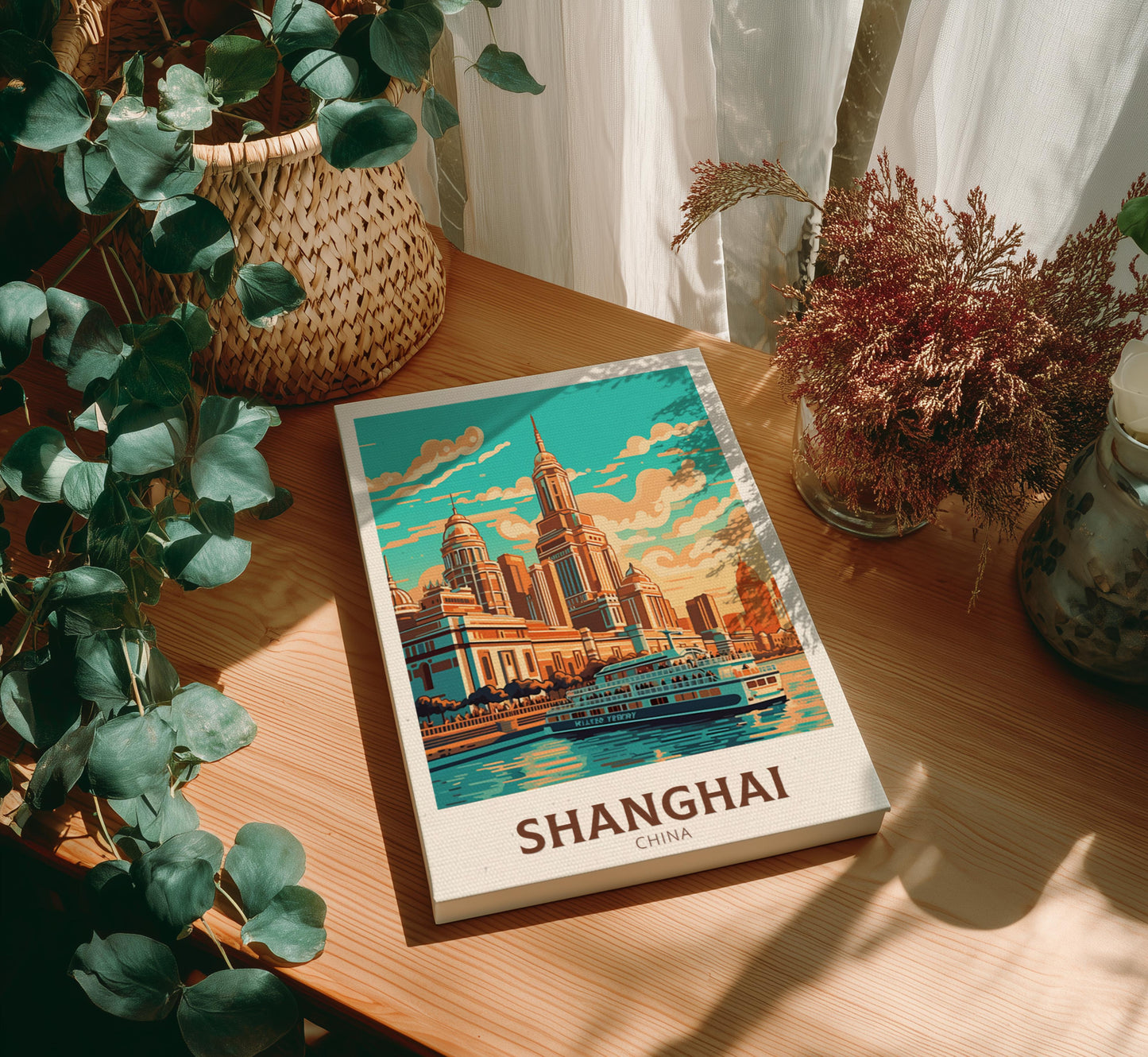 Canvas with a Shanghai illustration on a wooden table with plants
