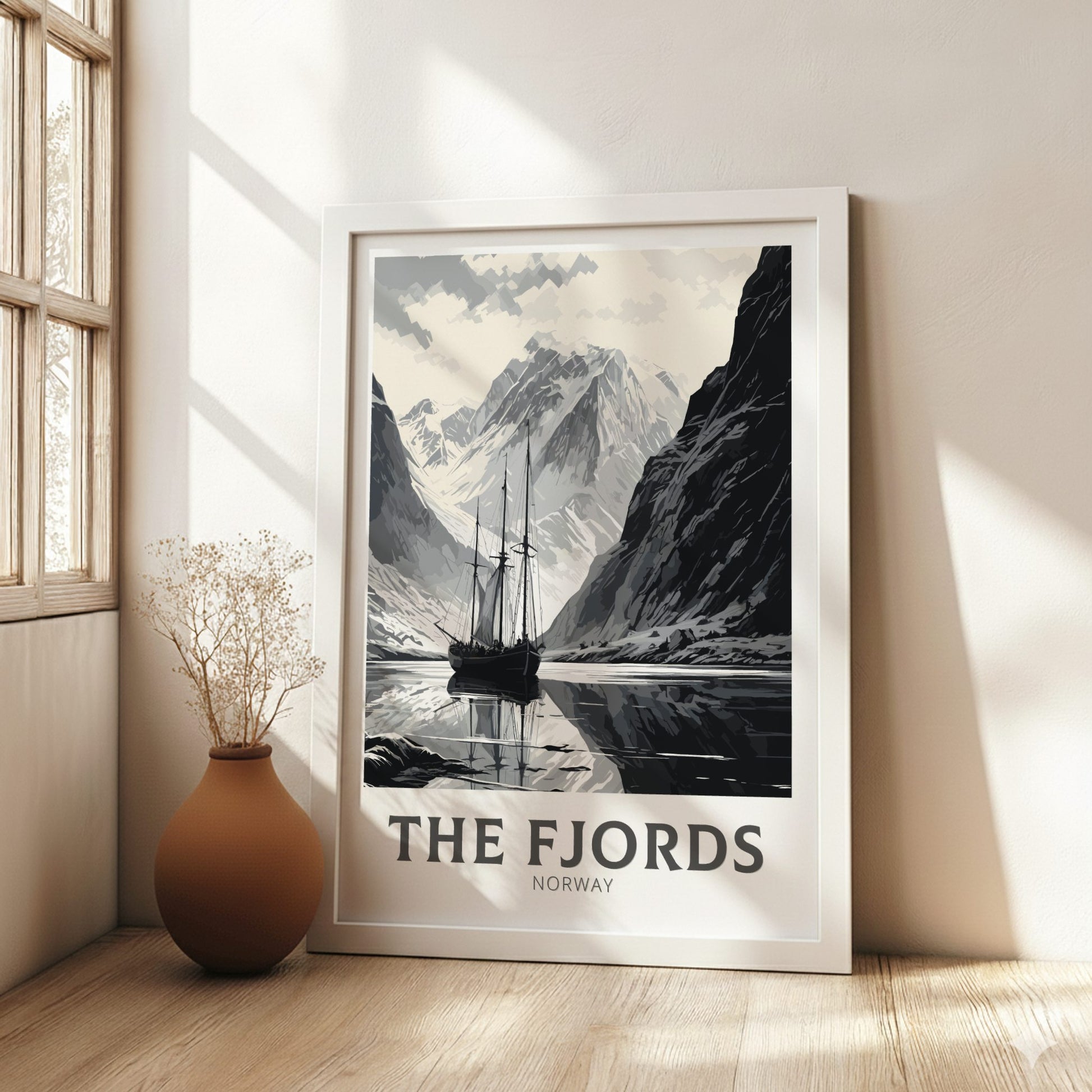 Framed poster of 'The Fjords, Norway' in a room with a vase and window.
