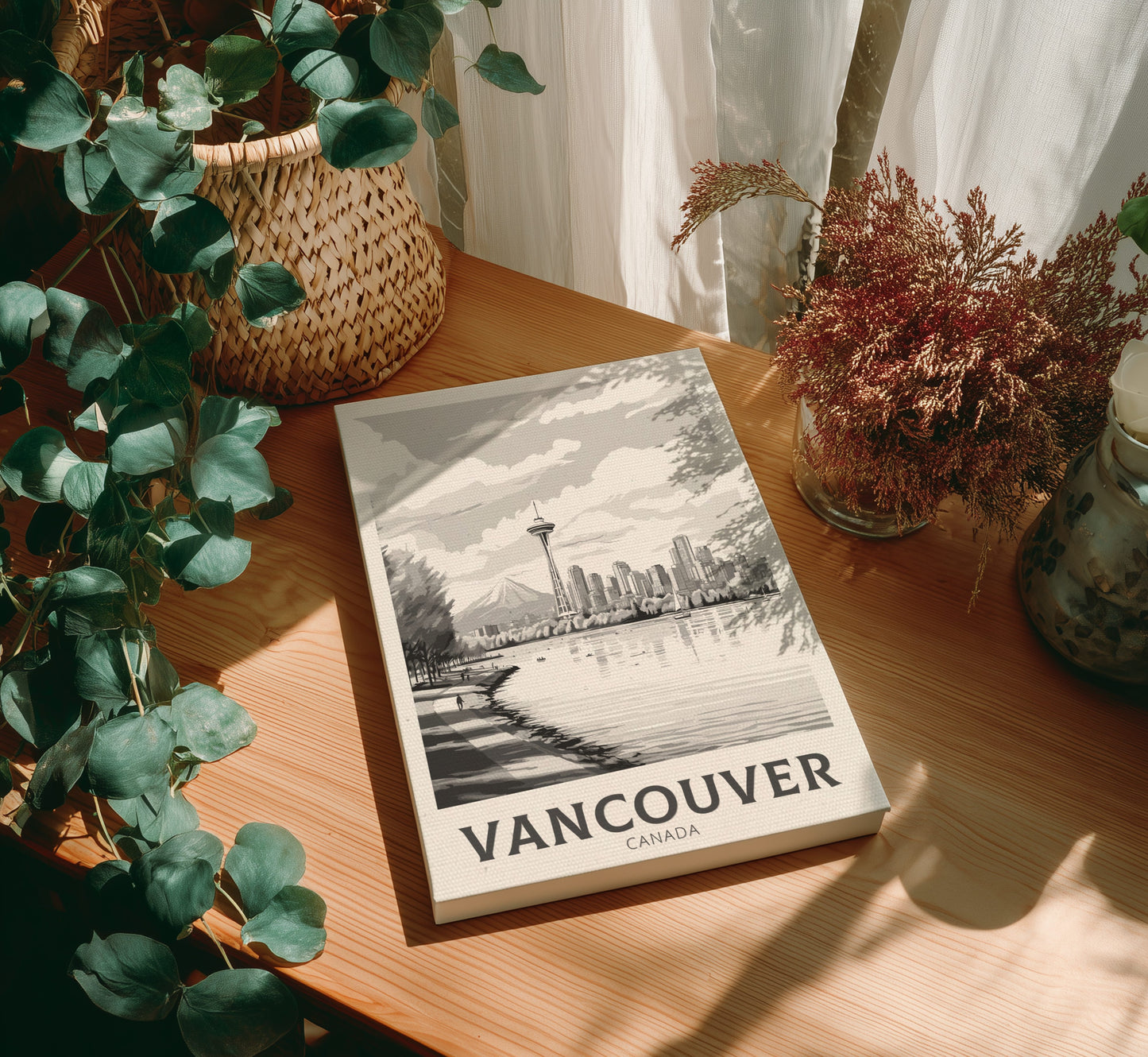 Canvas of 'Vancouver Canada' on a wooden table with plants