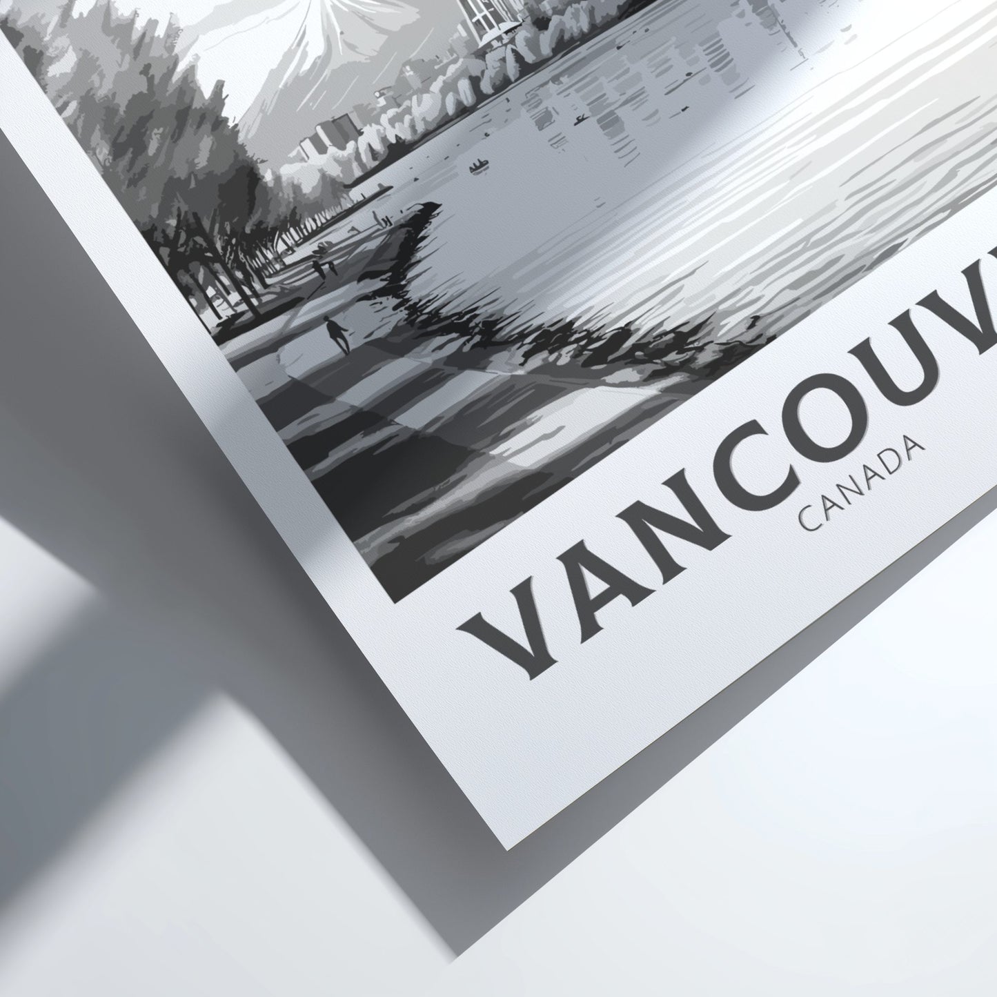 Framed black and white photo of a cityscape with 'Vancouver Canada' text.