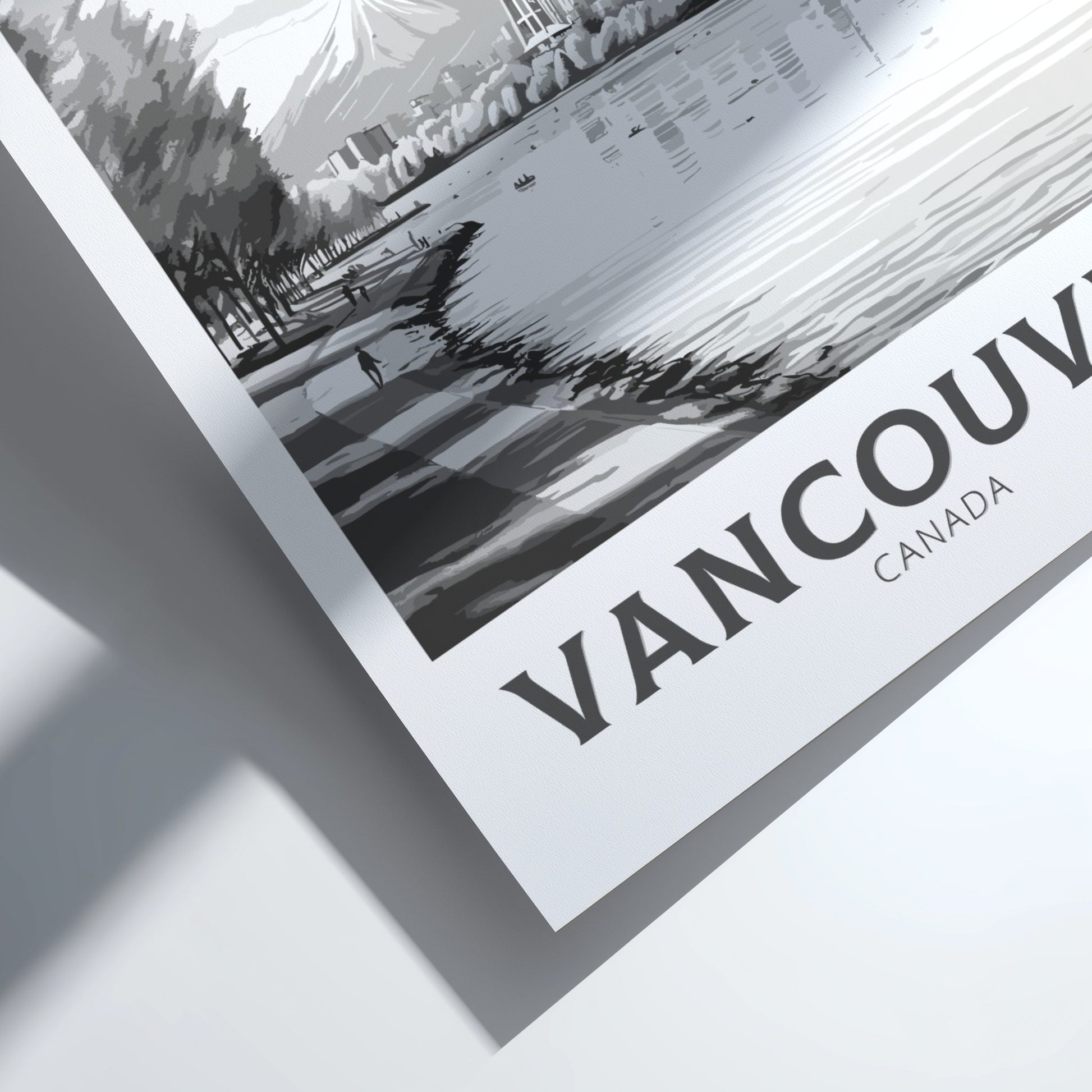 Framed black and white photo of a cityscape with 'Vancouver Canada' text.