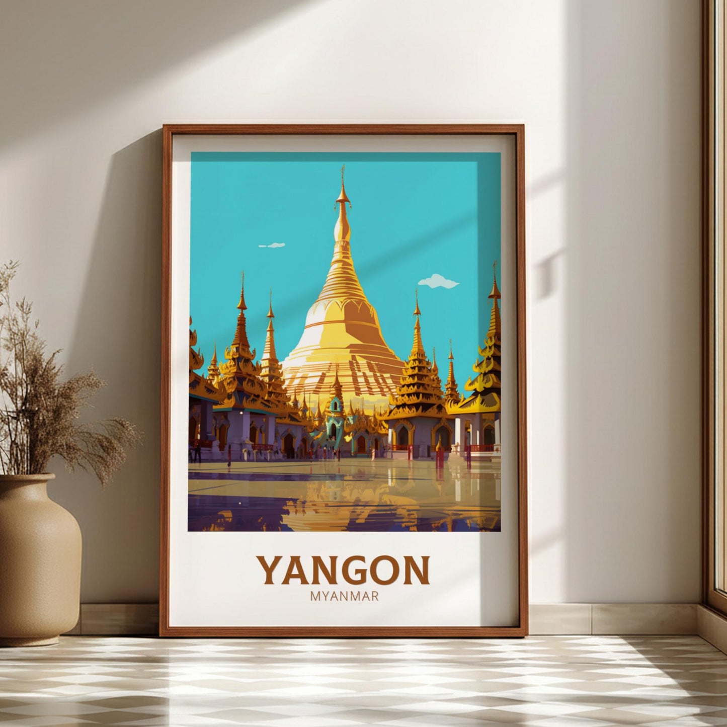 Framed poster of a golden temple with 'Yangon Myanmar' text on a wall.