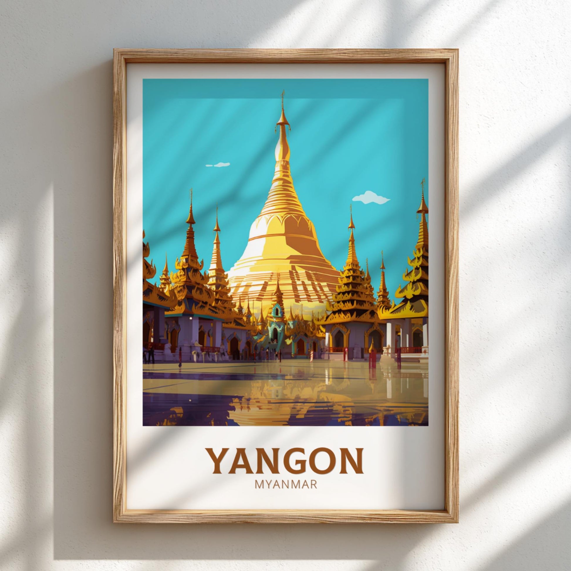 Framed artwork of a golden temple with 'Yangon Myanmar' text on a light background